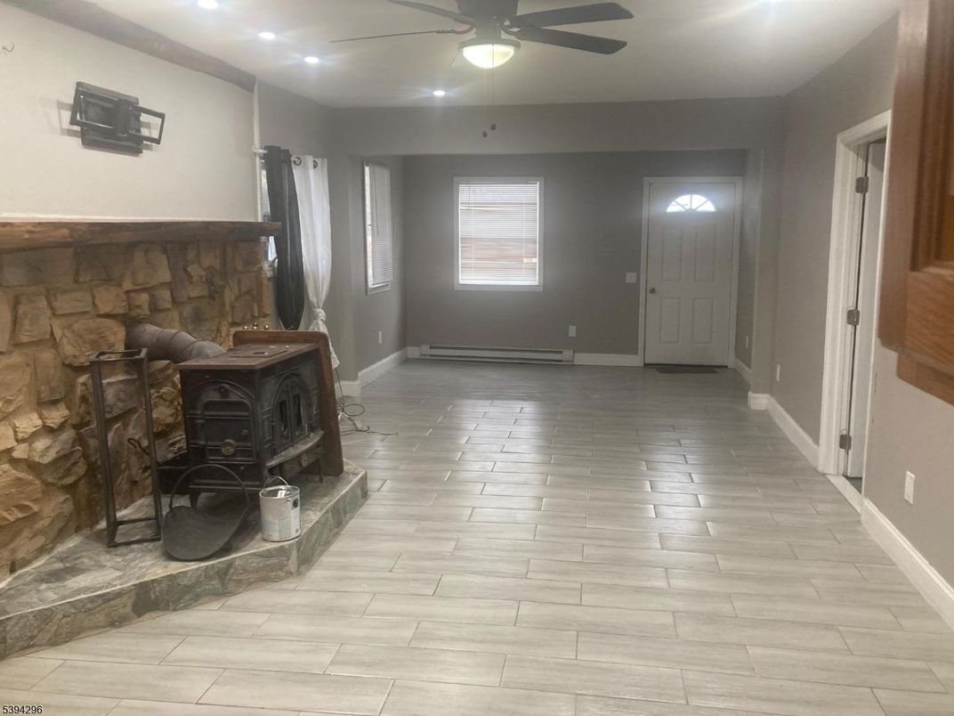 Fireplace, Interior, Recessed Lighting, Wood Texture Flooring