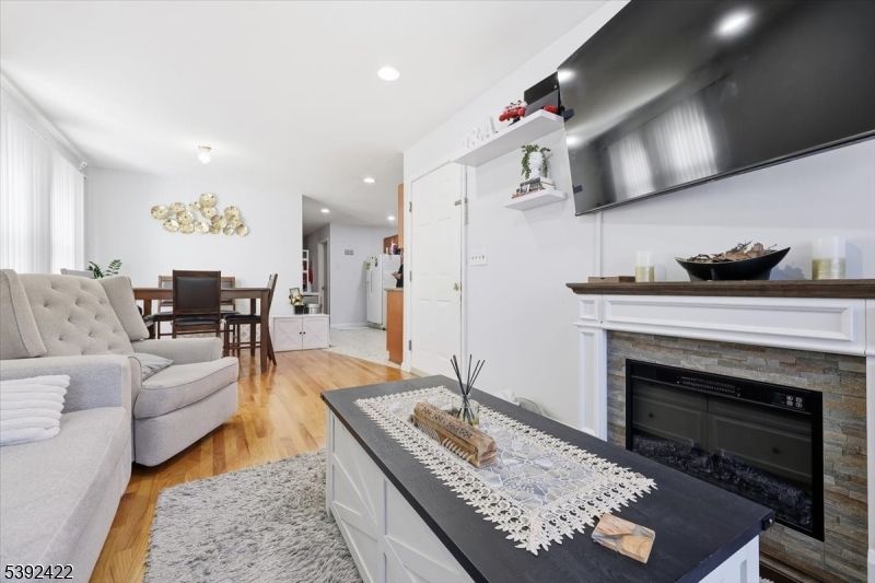 Dining room, Fireplace, Interior, Kitchen, Recessed Lighting, Wood Texture Flooring