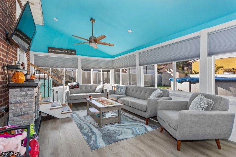 Fireplace, Interior, Living room, Stone Walls, Sun Room, Wood Texture Flooring