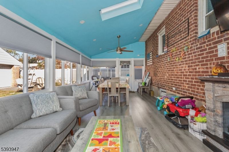 Dining room, Fireplace, Interior, Living room, Stone Walls, Wood Texture Flooring