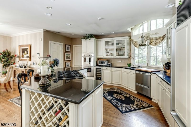 Dining room, Interior, Kitchen, Recessed Lighting, Stainless Steel Appliances, Wood Texture Flooring