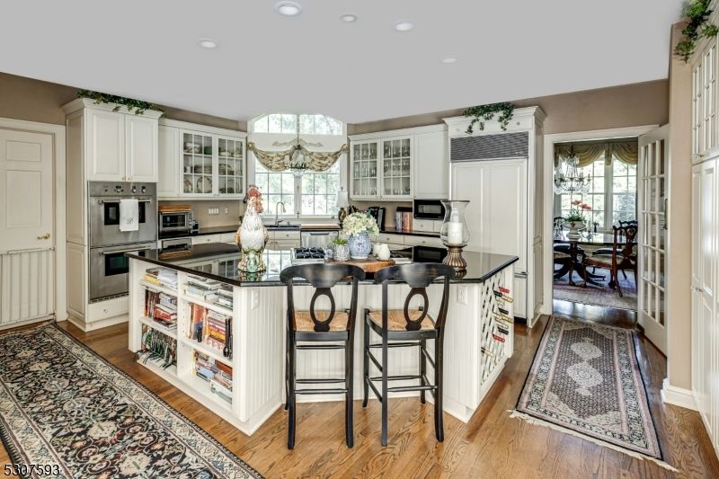 Dining room, Interior, Kitchen, Recessed Lighting, Stainless Steel Appliances, Wood Texture Flooring