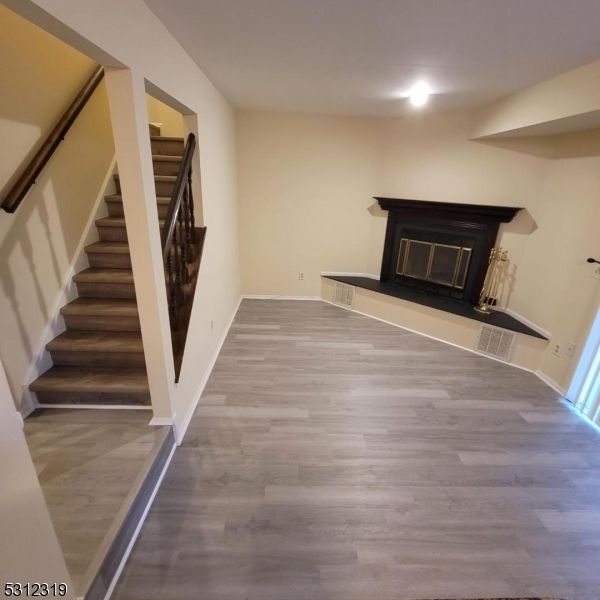 Fireplace, Interior, Recessed Lighting, Wood Texture Flooring