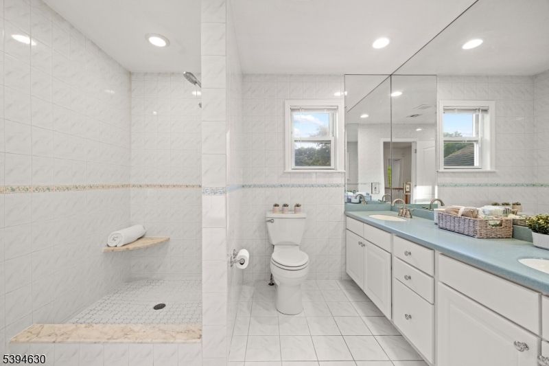 Bathroom, Dual Sink Vanities, Interior, Marble, Marble Walls, Recessed Lighting