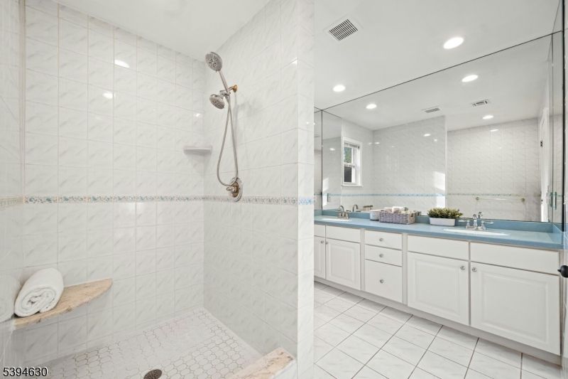 Bathroom, Dual Sink Vanities, Interior, Marble Walls, Recessed Lighting