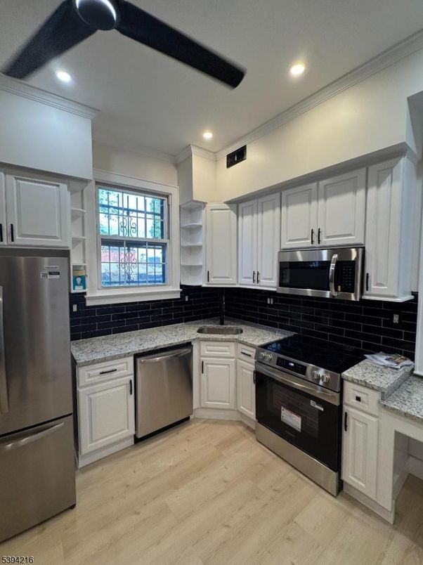 Interior, Kitchen, Recessed Lighting, Stainless Steel Appliances, Wood Texture Flooring