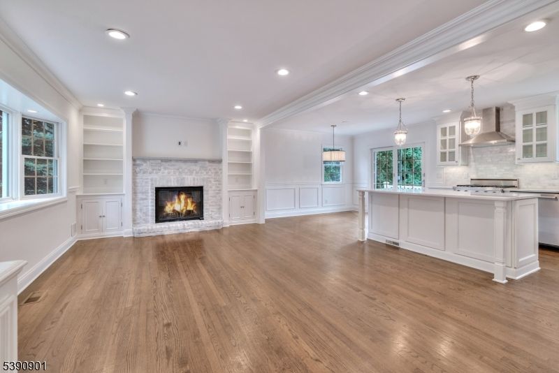 Empty room, Fireplace, Interior, Kitchen, Pendant Lights, Recessed Lighting, Wood Texture Flooring