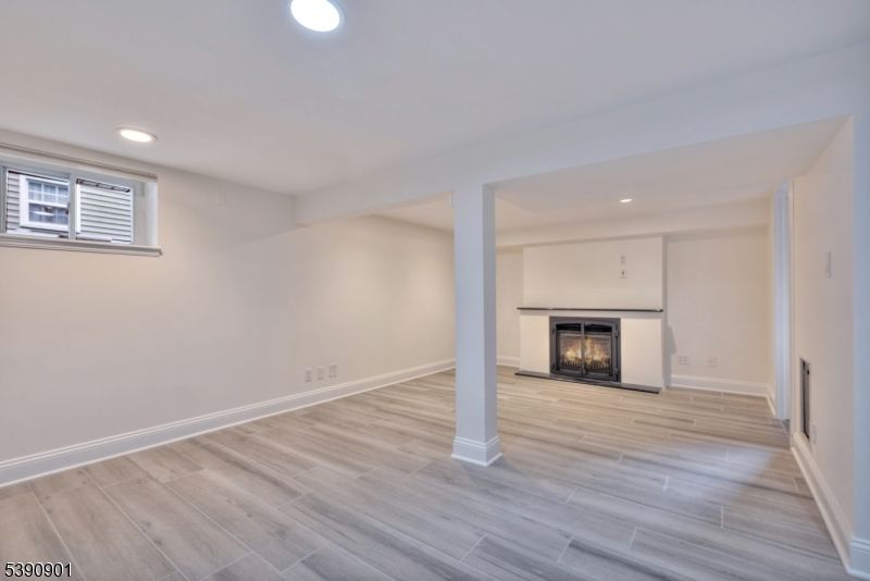 Empty room, Fireplace, Interior, Recessed Lighting, Wood Texture Flooring