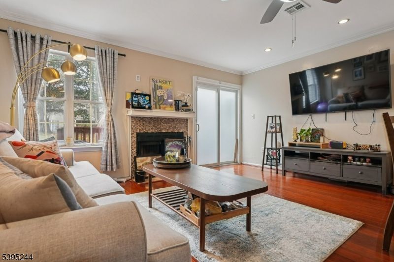 Fireplace, Interior, Living room, Recessed Lighting, Wood Texture Flooring