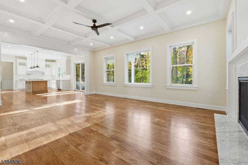 Empty room, Fireplace, Interior, Kitchen, Pendant Lights, Recessed Lighting, Wood Texture Flooring