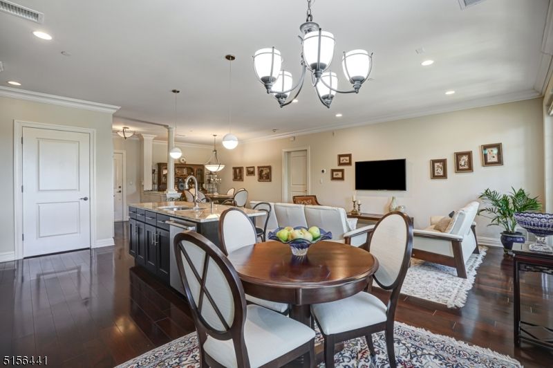 Chandelier, Dining room, Interior, Kitchen, Living room, Pendant Lights, Recessed Lighting, Wood Texture Flooring