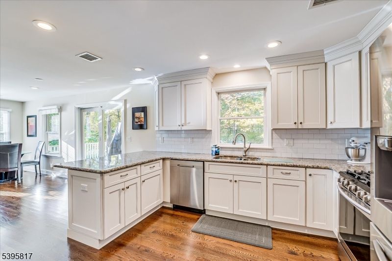 Dining room, Interior, Kitchen, Recessed Lighting, Stainless Steel Appliances, Wood Texture Flooring