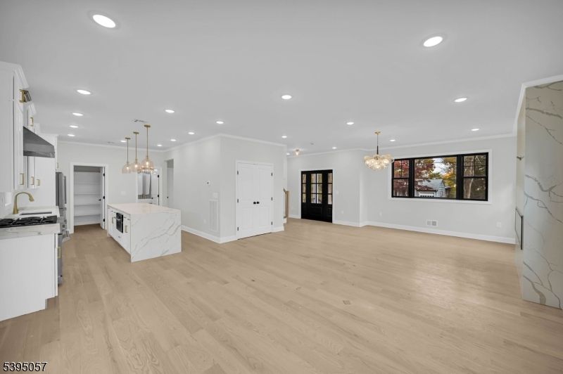 Chandelier, Interior, Kitchen, Marble Walls, Pendant Lights, Recessed Lighting, Wood Texture Flooring