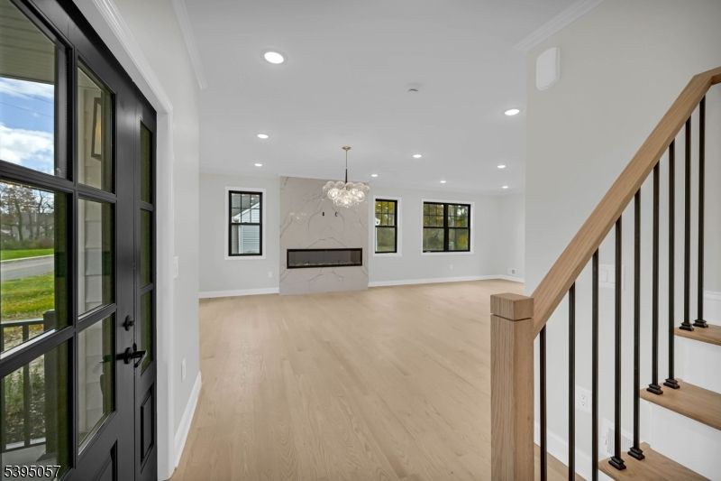 Chandelier, Interior, Marble Walls, Recessed Lighting, Wood Texture Flooring