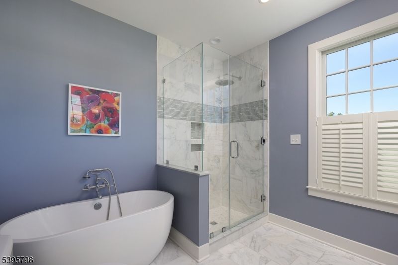 Bathroom, Free Standing Baths, Glass Shower, Interior, Marble, Marble Walls, Recessed Lighting