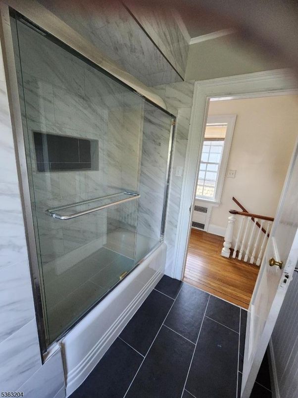 Bathroom, Glass Shower, Interior, Marble Walls, Wood Texture Flooring