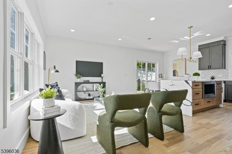 Chandelier, Dining room, Interior, Kitchen, Living room, Pendant Lights, Recessed Lighting, Wood Texture Flooring