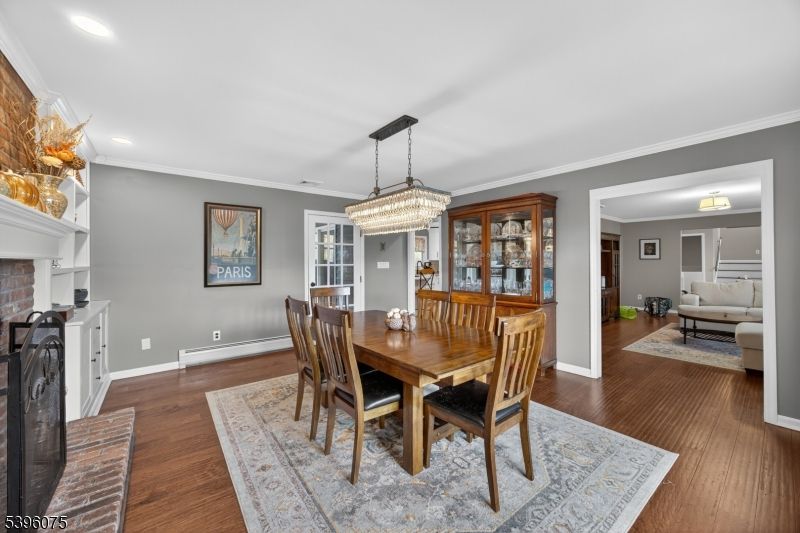 Chandelier, Dining room, Fireplace, Interior, Recessed Lighting, Wood Texture Flooring