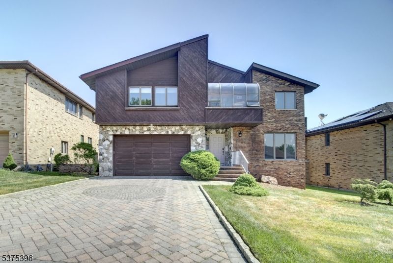 Attached, Exterior, Facade, Brick Facade, Modern