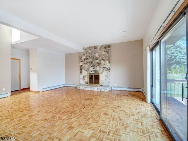 Empty room, Fireplace, Interior, Stone Walls, Wood Texture Flooring