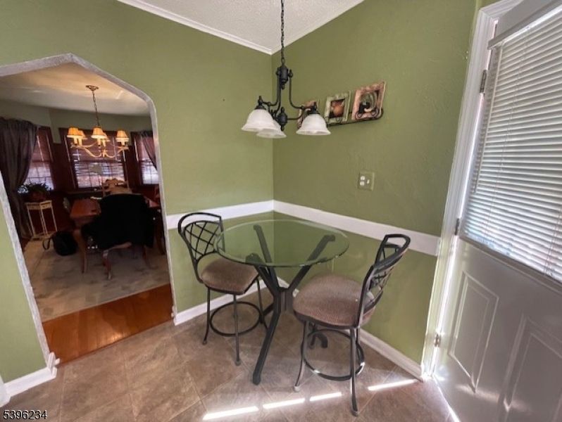 Chandelier, Dining room, Interior, Pendant Lights, Wood Texture Flooring
