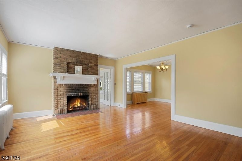 Chandelier, Empty room, Fireplace, Interior, Wood Texture Flooring