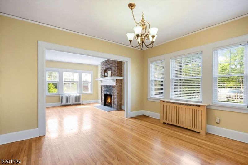 Chandelier, Empty room, Fireplace, Interior, Wood Texture Flooring
