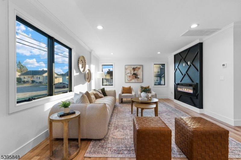 Fireplace, Interior, Living room, Recessed Lighting, Wood Texture Flooring