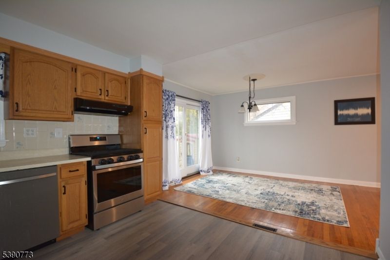 Interior, Kitchen, Pendant Lights, Stainless Steel Appliances, Wood Texture Flooring