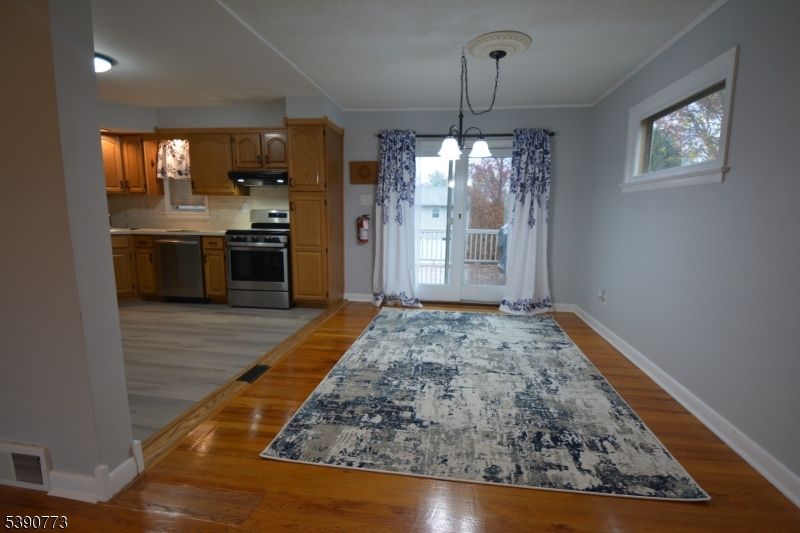 Interior, Kitchen, Pendant Lights, Stainless Steel Appliances, Wood Texture Flooring
