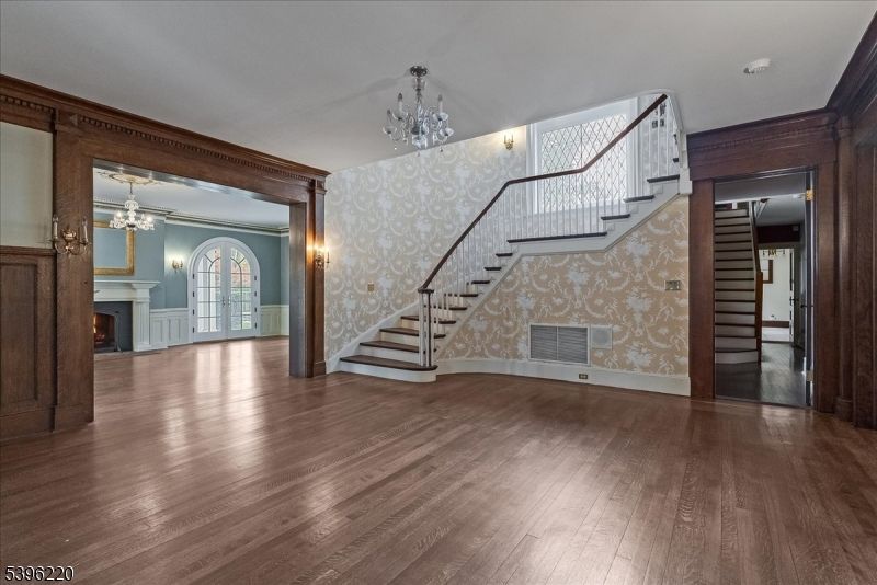 Chandelier, Empty room, Fireplace, Interior, Pendant Lights, Wood Texture Flooring