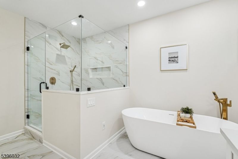 Bathroom, Free Standing Baths, Glass Shower, Interior, Marble, Marble Walls, Recessed Lighting