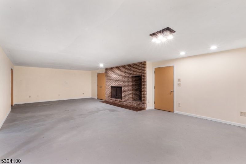 Empty room, Fireplace, Interior, Recessed Lighting, Stone Walls