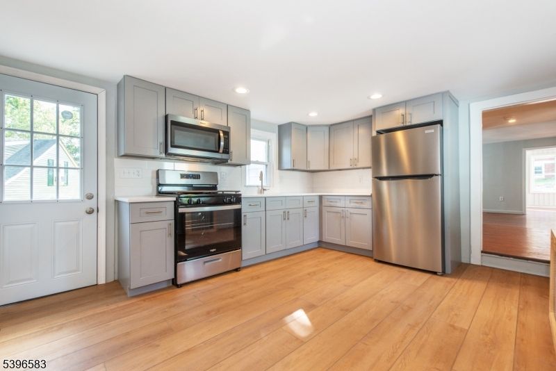 Interior, Kitchen, Recessed Lighting, Stainless Steel Appliances, Wood Texture Flooring