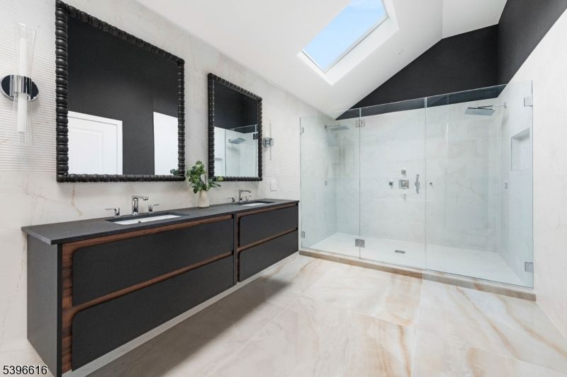 Bathroom, Dual Sink Vanities, Glass Ceilings, Glass Shower, Interior, Marble, Marble Walls, Recessed Lighting