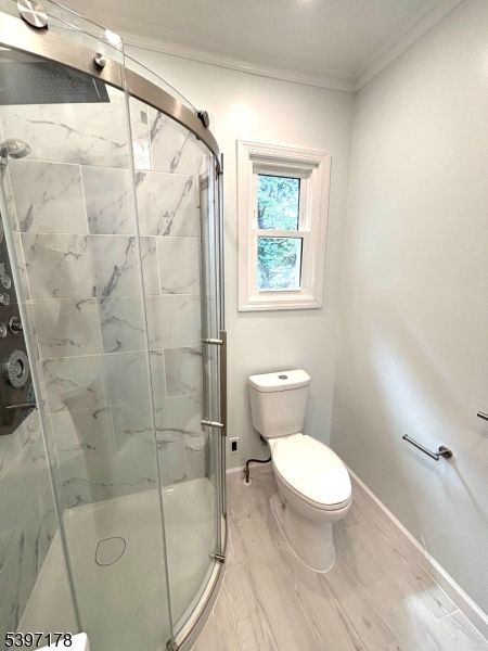 Bathroom, Glass Shower, Interior, Marble, Marble Walls, Recessed Lighting, Wood Texture Flooring