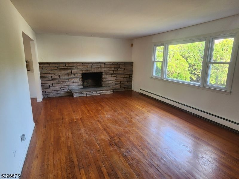 Empty room, Fireplace, Interior, Stone Walls, Wood Texture Flooring