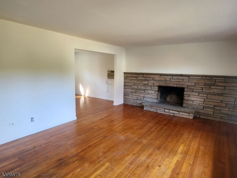 Empty room, Fireplace, Interior, Stone Walls, Wood Texture Flooring