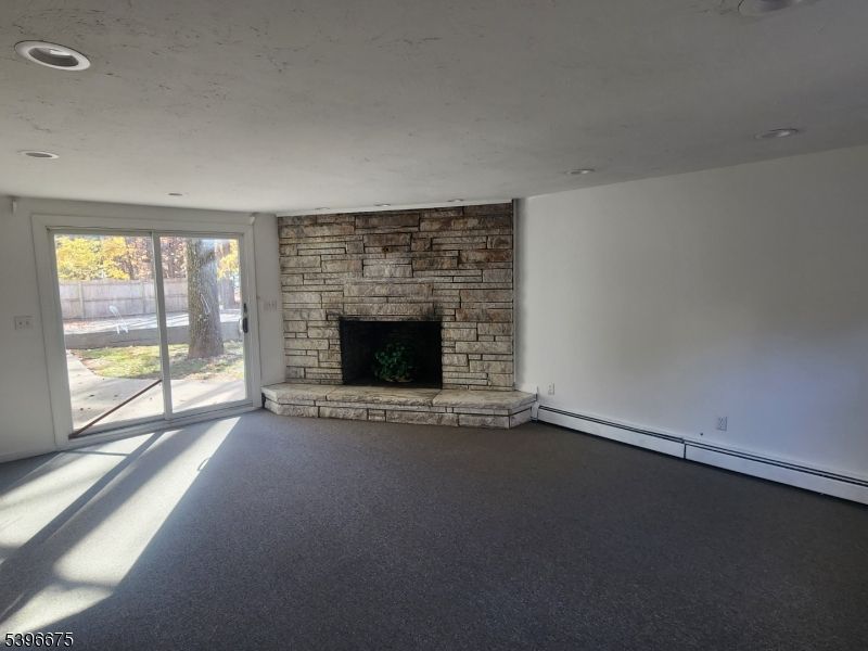 Empty room, Fireplace, Interior, Recessed Lighting, Stone Walls