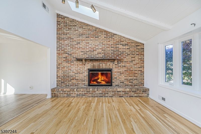 Empty room, Fireplace, Interior, Stone Walls, Wood Texture Flooring