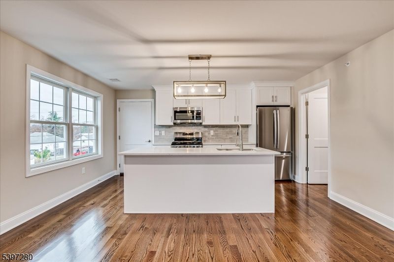 Interior, Kitchen, Pendant Lights, Stainless Steel Appliances, Wood Texture Flooring