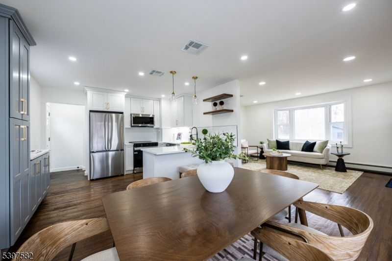 Dining room, Interior, Kitchen, Living room, Pendant Lights, Recessed Lighting, Stainless Steel Appliances, Wood Texture Flooring