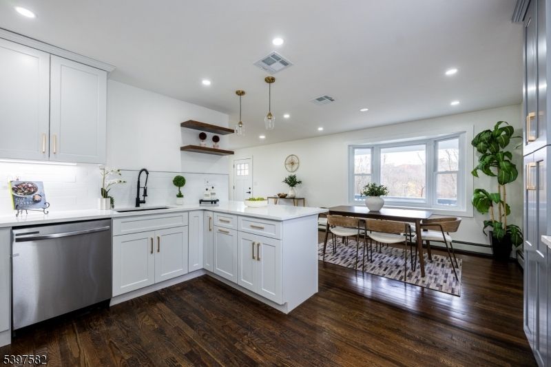 Dining room, Interior, Kitchen, Pendant Lights, Recessed Lighting, Stainless Steel Appliances, Wood Texture Flooring