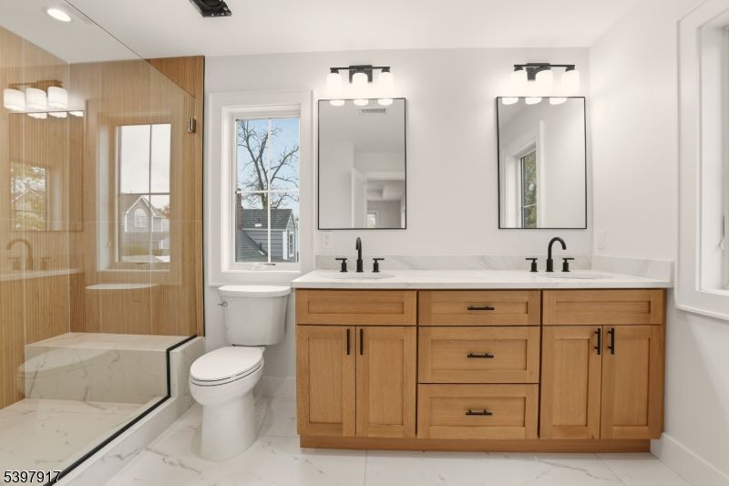Bathroom, Dual Sink Vanities, Glass Shower, Interior, Marble, Recessed Lighting