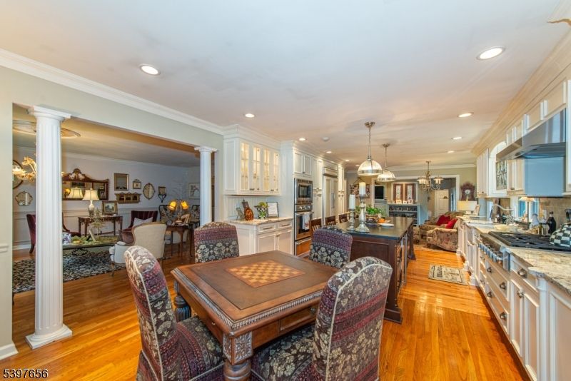 Dining room, Interior, Kitchen, Living room, Pendant Lights, Recessed Lighting, Stainless Steel Appliances, Wood Texture Flooring