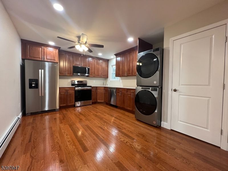 Interior, Kitchen, Recessed Lighting, Stainless Steel Appliances, Washer, Wood Texture Flooring