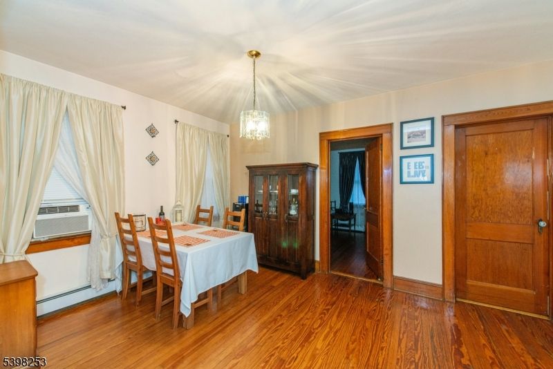 Chandelier, Dining room, Interior, Pendant Lights, Wood Texture Flooring
