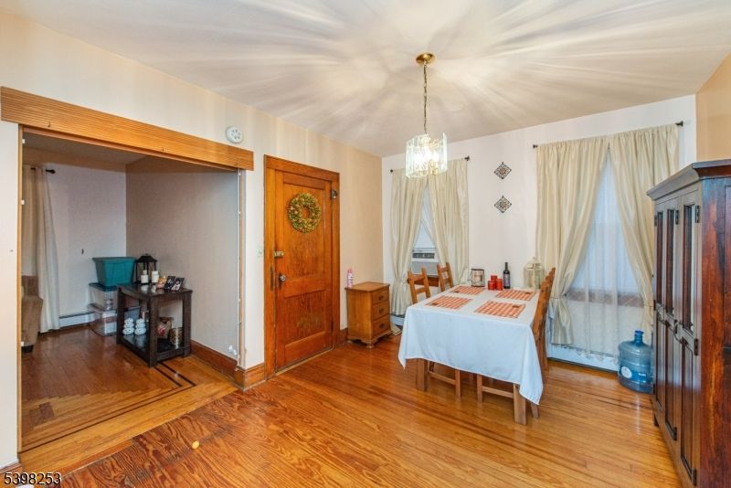 Chandelier, Dining room, Interior, Pendant Lights, Wood Texture Flooring