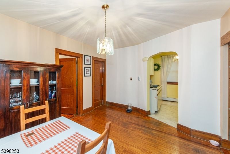 Chandelier, Dining room, Interior, Pendant Lights, Wood Texture Flooring