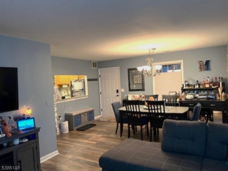 Chandelier, Dining room, Interior, Wood Texture Flooring